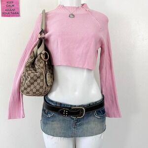 pink ribbed zip-up mock neck sweater